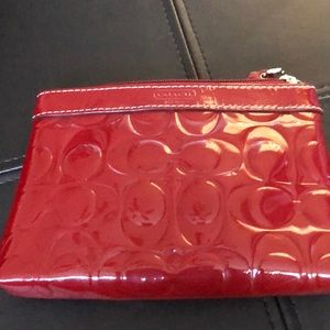 Coach red patent leather wristlet